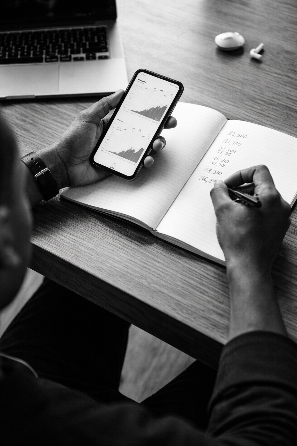 Young person studying numbers on a laptop